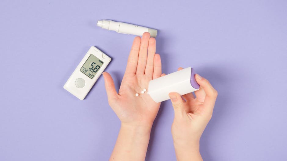 Close-up of hands using diabetes tools with a glucose monitor on a purple background.