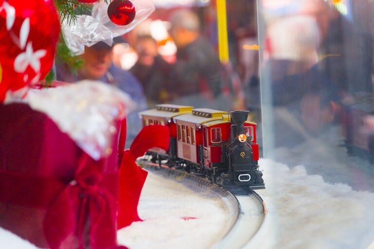 A charming miniature train set amidst holiday decorations at Zurich's Christmas market.